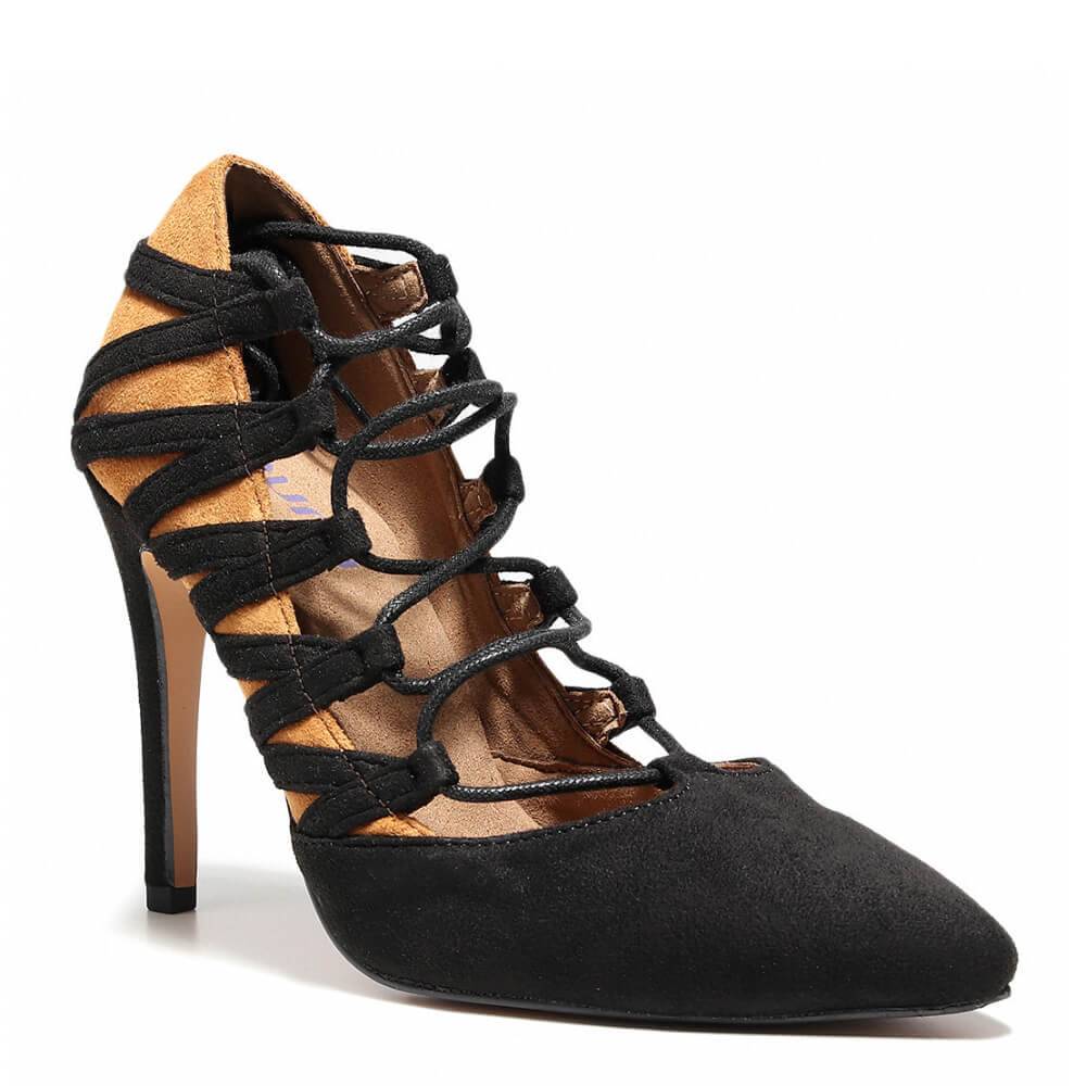 a pair of black high heels with laces